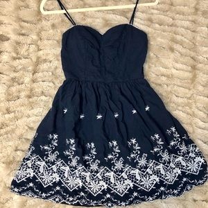 Navy blue mini dress with white embroidery